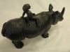 19 GIRL ON HER RHINO